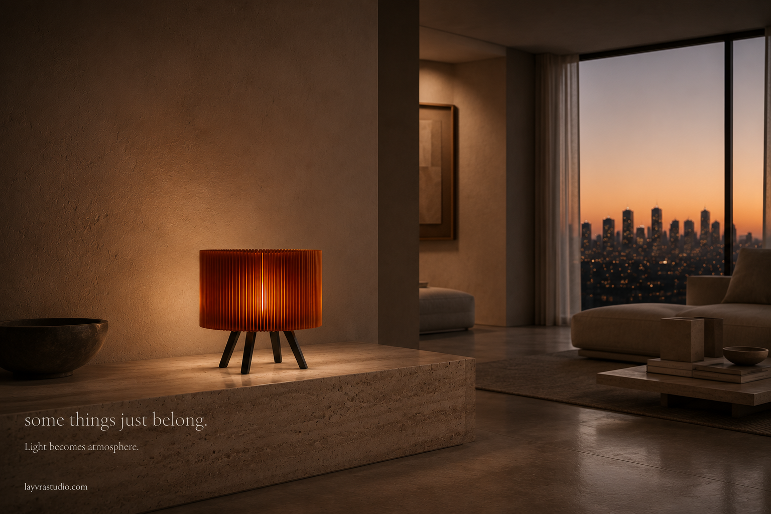 Orbit Amber table lamp glowing on a table in a warm interior.